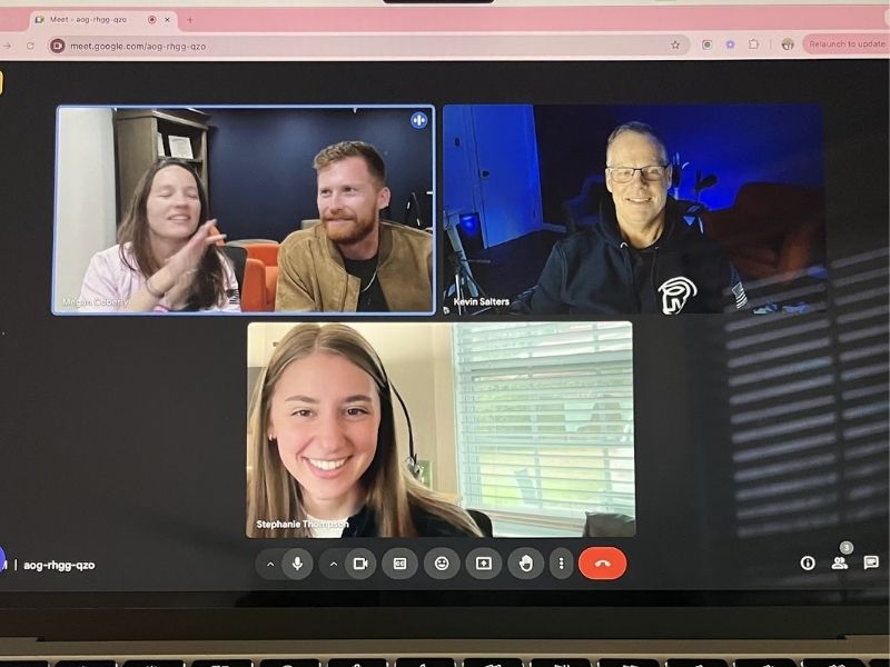 screenshot of people on zoom meeting laughing